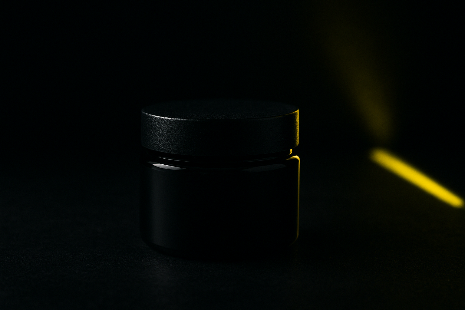 Numbing cream product in dramatic moody lighting — guide by Tattoo Numbing Cream Co.