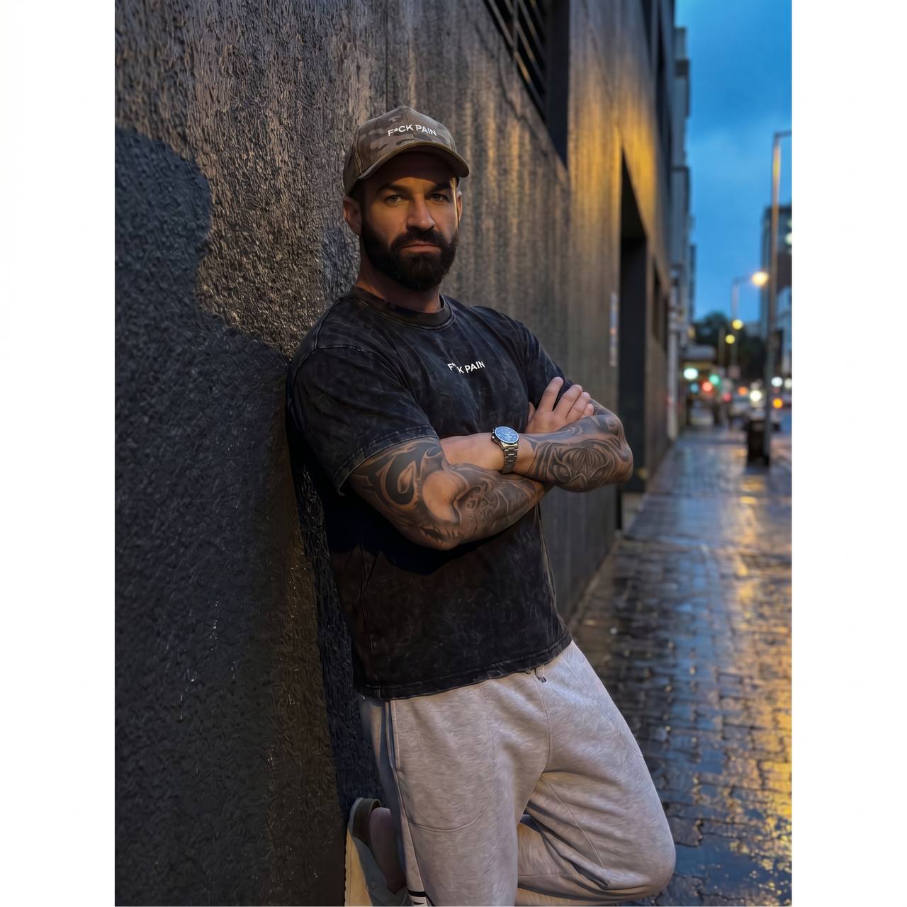 F*CK PAIN Merch Bundle — lifestyle front facing tee and cap
