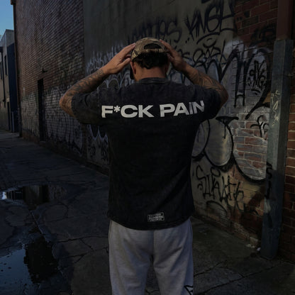 F*CK PAIN Distressed Camo Cap — lifestyle back hands